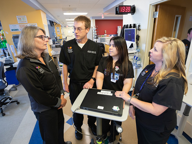 PICU nurses having a discussion